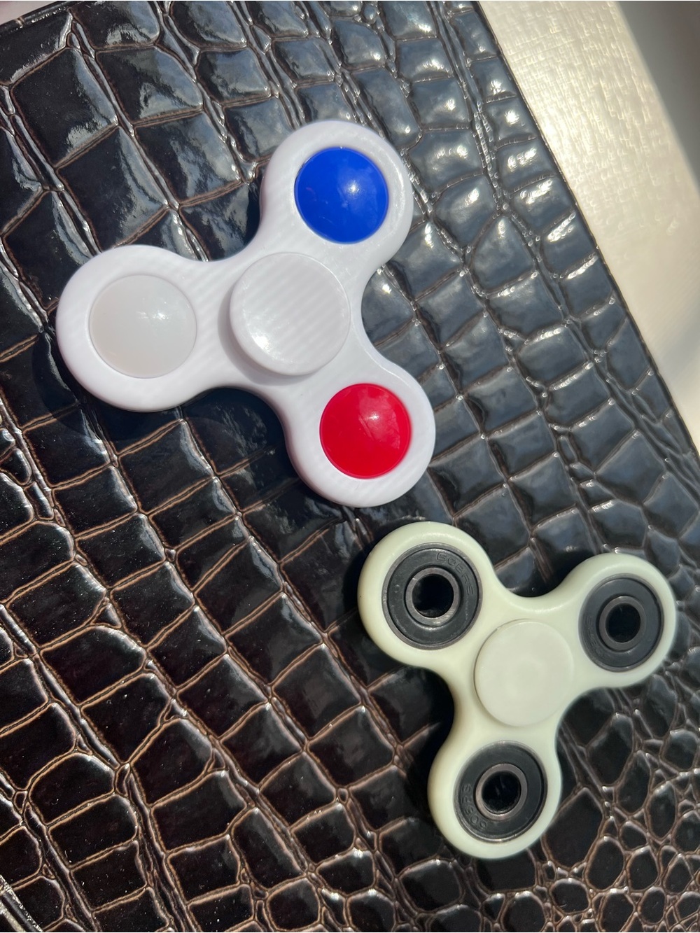 Set of Two Tri-Spinner Fidget Toys - White w Red & Blue & 1 Glow in the dark